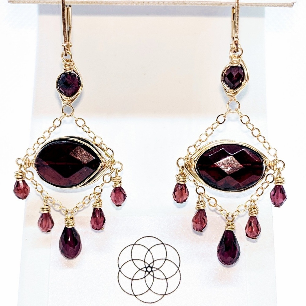 Garnet and 14 karat gold filled earrings $90